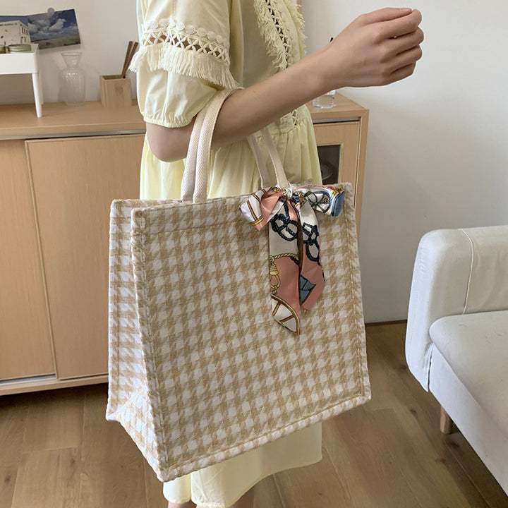 Elegant Houndstooth Handbag with Decorative Bow