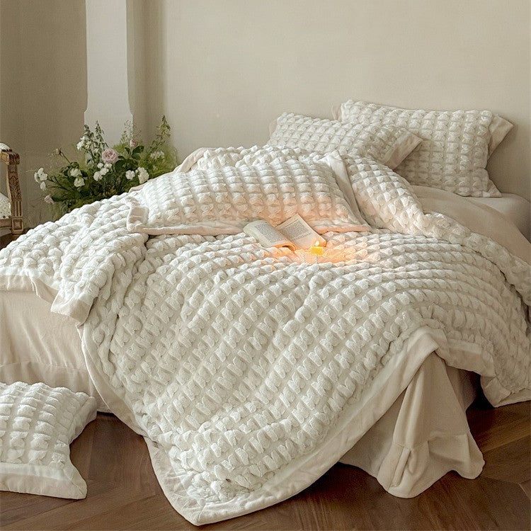 Quilted velvet bedding set with 3D waffle structure and decorative border Stornfield