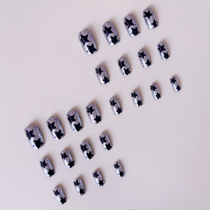 Artificial nail set with glamorous rhinestone embellishments and star motifs Stornfield