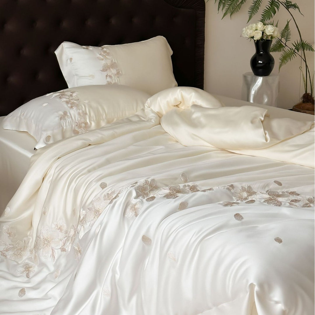 Luxurious satin bedding set with floral embroidery border and silky shine surface