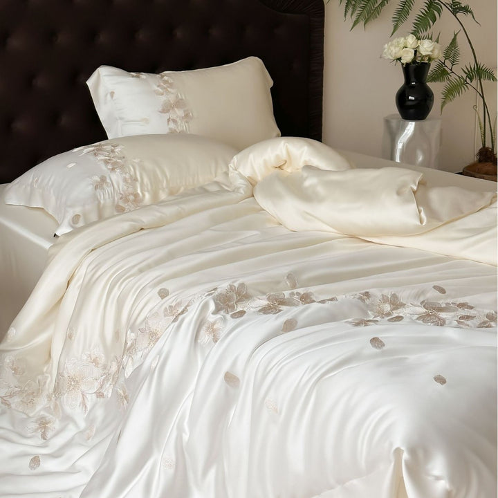 Luxurious satin bedding set with floral embroidery border and silky shine surface