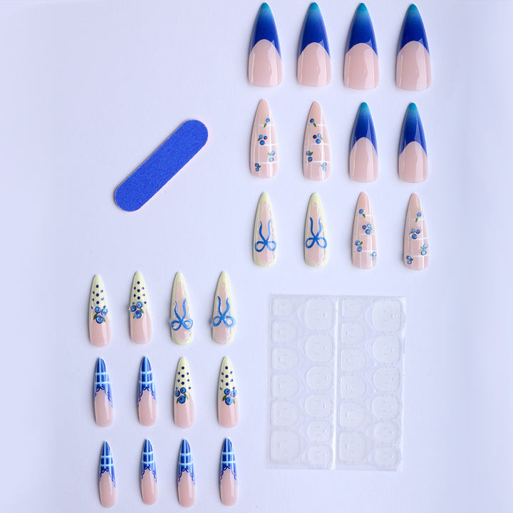 Artificial nails with playful design and elegant accents Stornfield