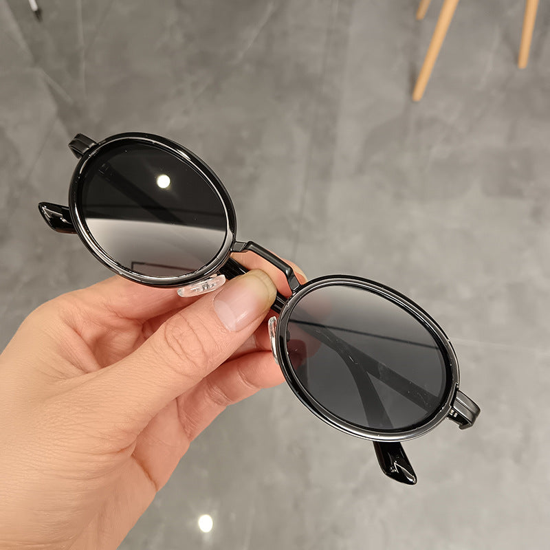 Women's round sunglasses with lightweight lenses and gold accents Stornfield