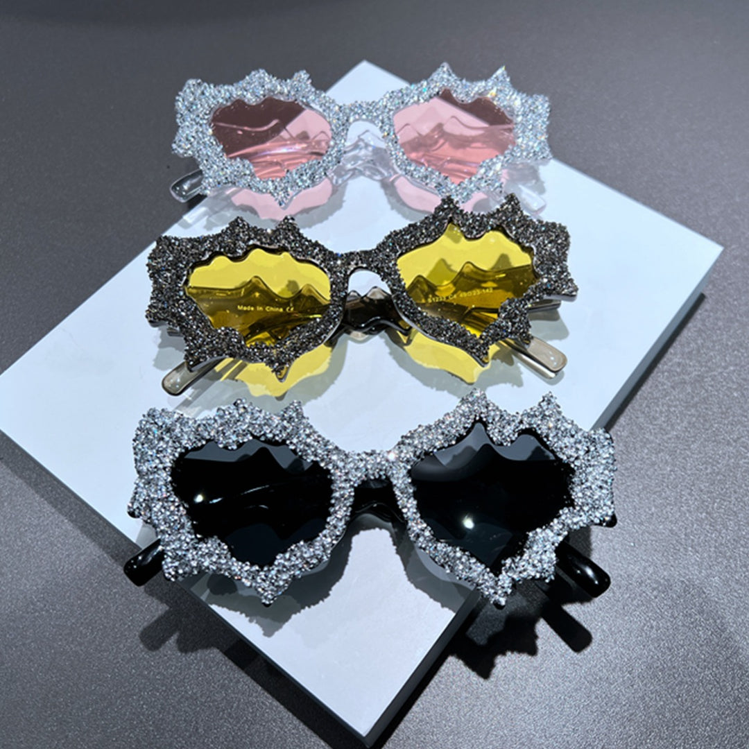 Ladies creative sunglasses in an extravagant design with glitter embellishments Stornfield
