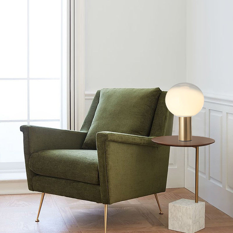 Modern Artistic Table Lamp with Sleek Metallic Base and Globe Shade