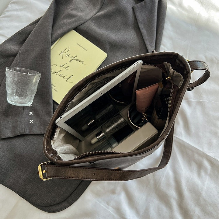Shoulder bag with charming applications Stornfield