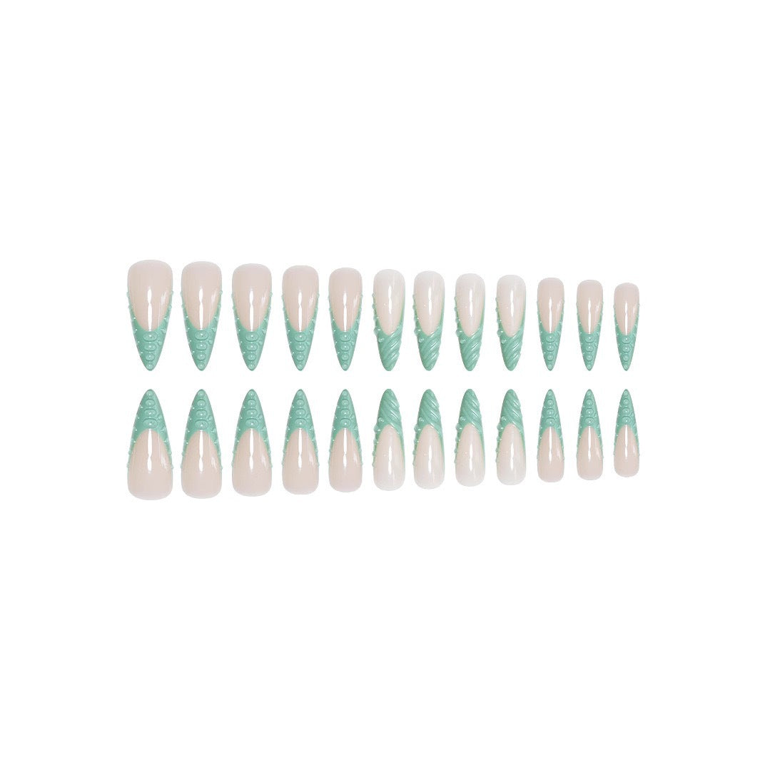 Artistic Stiletto Press-On Nail Design with 3D Shell Accents Stornfield