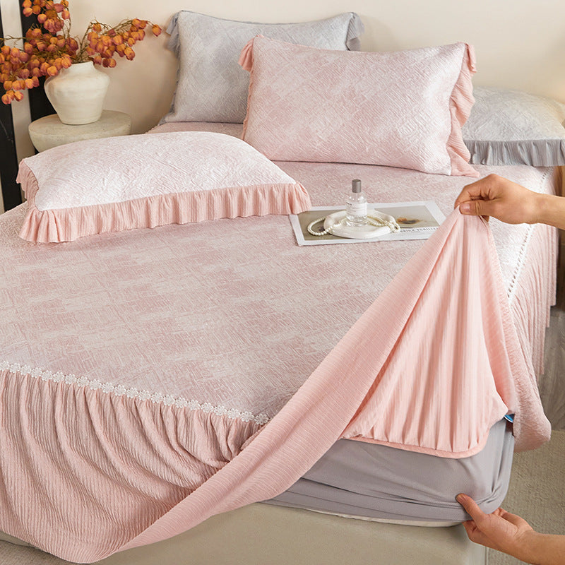 Reversible mattress protector with pleated ruffle and microfiber velvet surface
