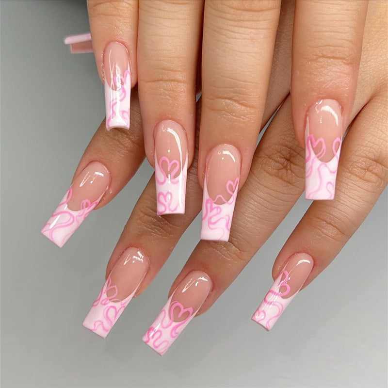 Artistic Long Press-On Nails with Heart Design Stornfield