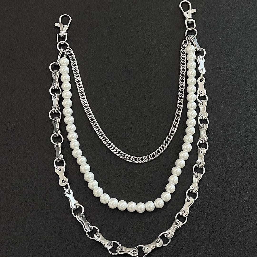 Fashionable chain bracelet with pearls and metal links Stornfield