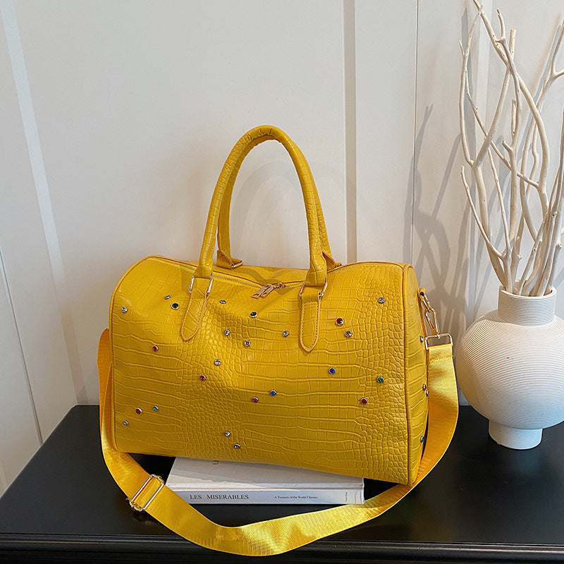Elegant Handbag with Luxurious Crocodile Pattern and Colorful Applications Stornfield