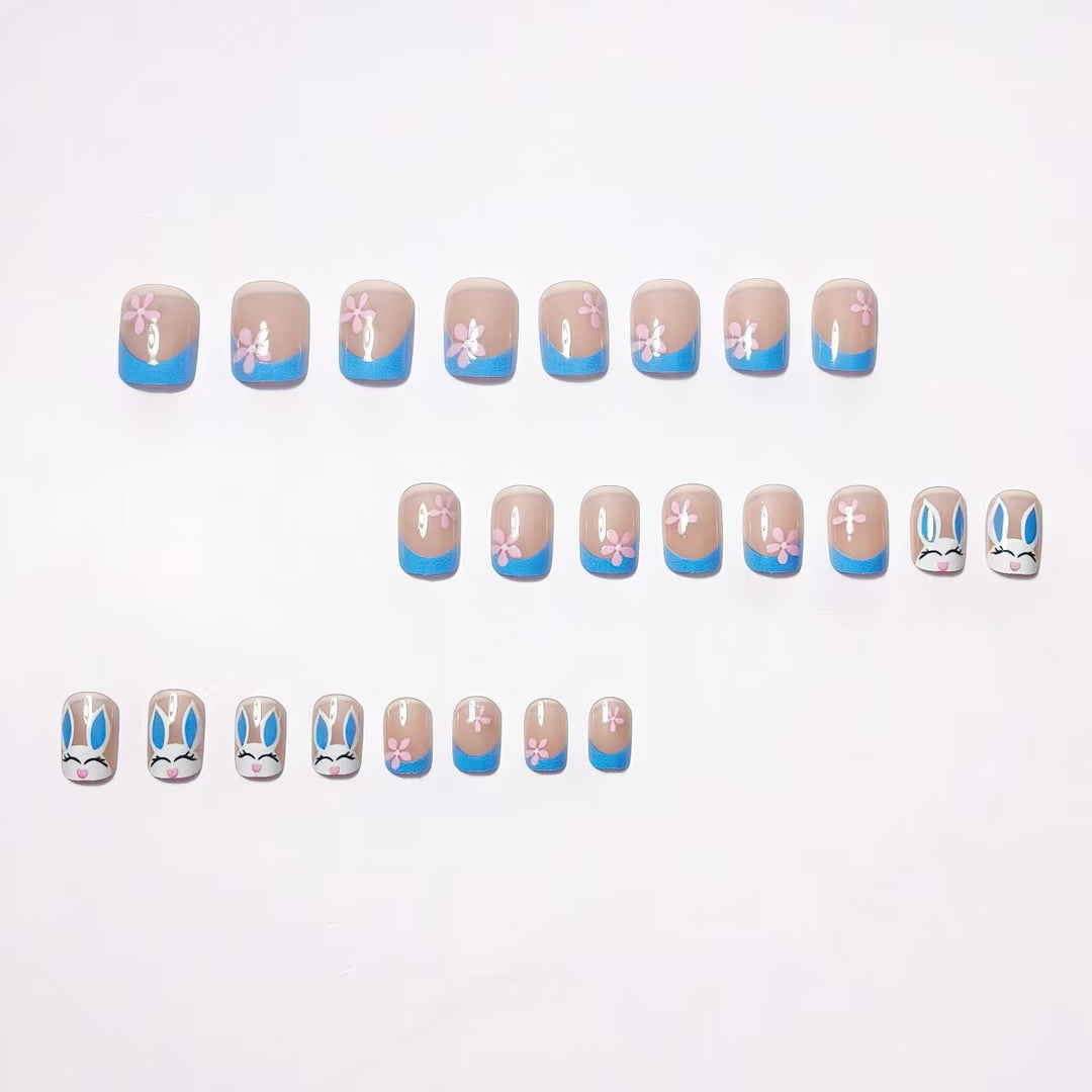 Creative nail art with cheerful bunny and flower pattern Stornfield