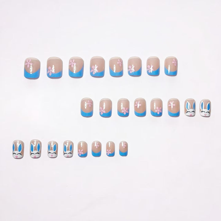 Creative nail art with cheerful bunny and flower pattern Stornfield
