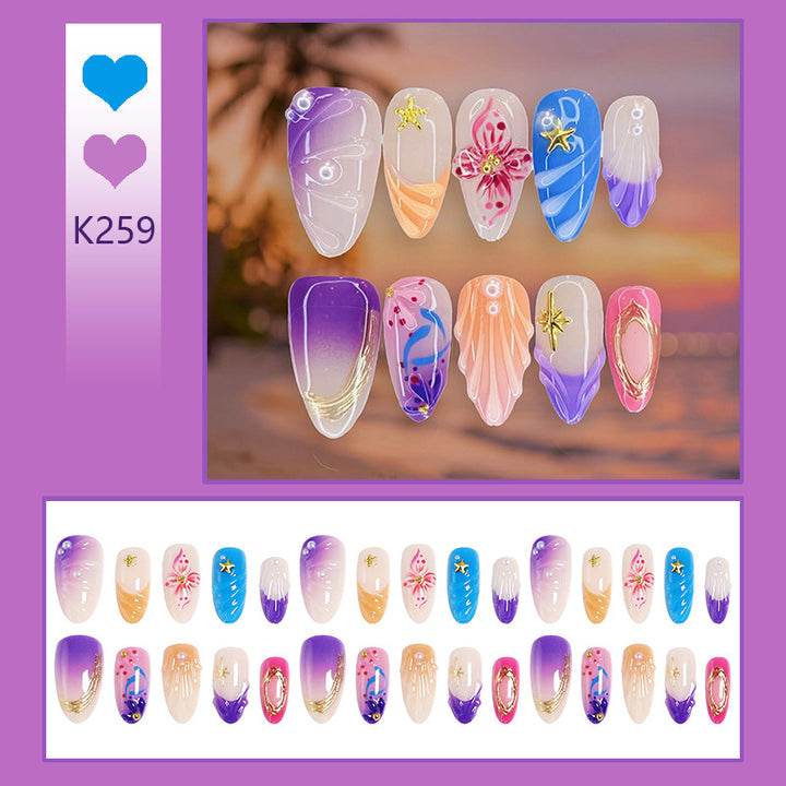Creative nail art set with floral and glamorous embellishments Stornfield