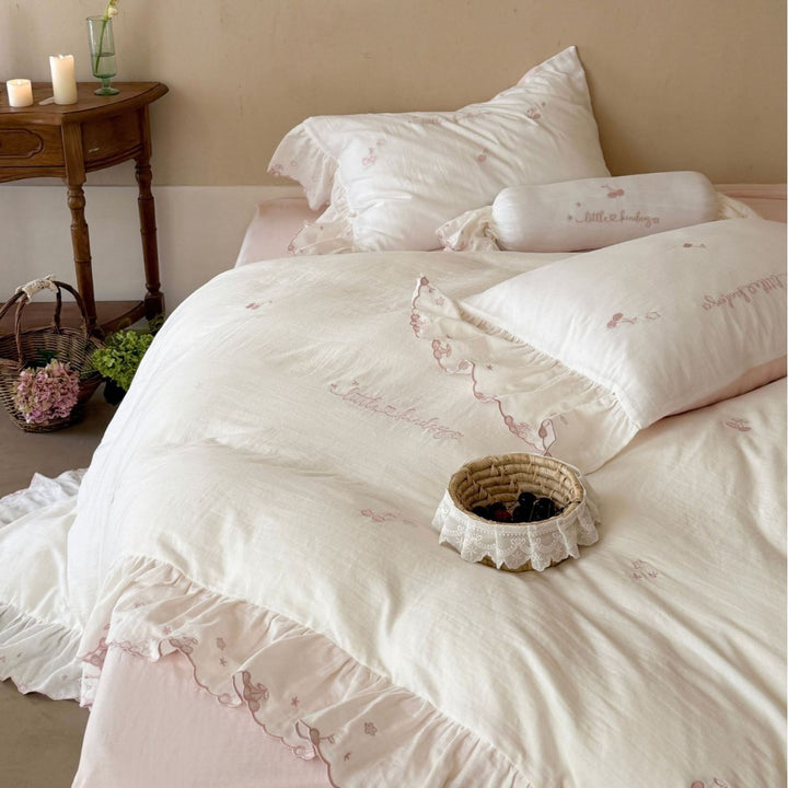 Romantic cotton bedding set with ruffles and delicate embroidery