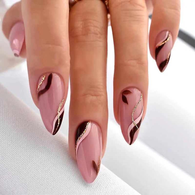 Artistic Nail Decoration with Gold Accents Stornfield