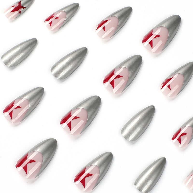 Artful stiletto nails with silver and star motifs Stornfield