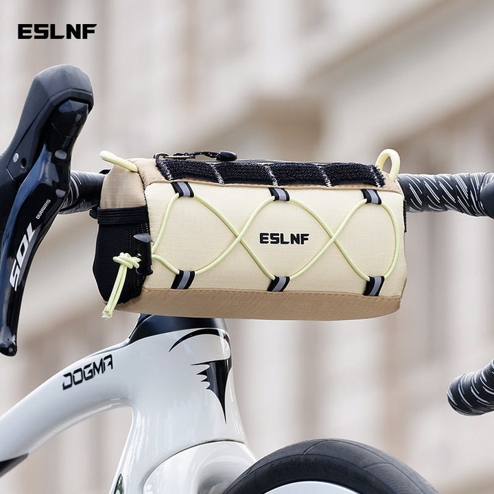 compact cylindrical handlebar bag with elastic bungee and universal Velcro mount Stornfield
