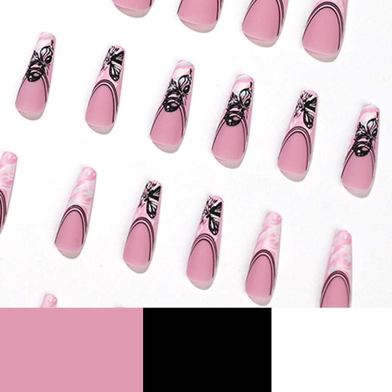 Artificial nail art with delicate butterfly designs Stornfield