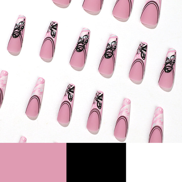 Artificial nail art with delicate butterfly designs Stornfield