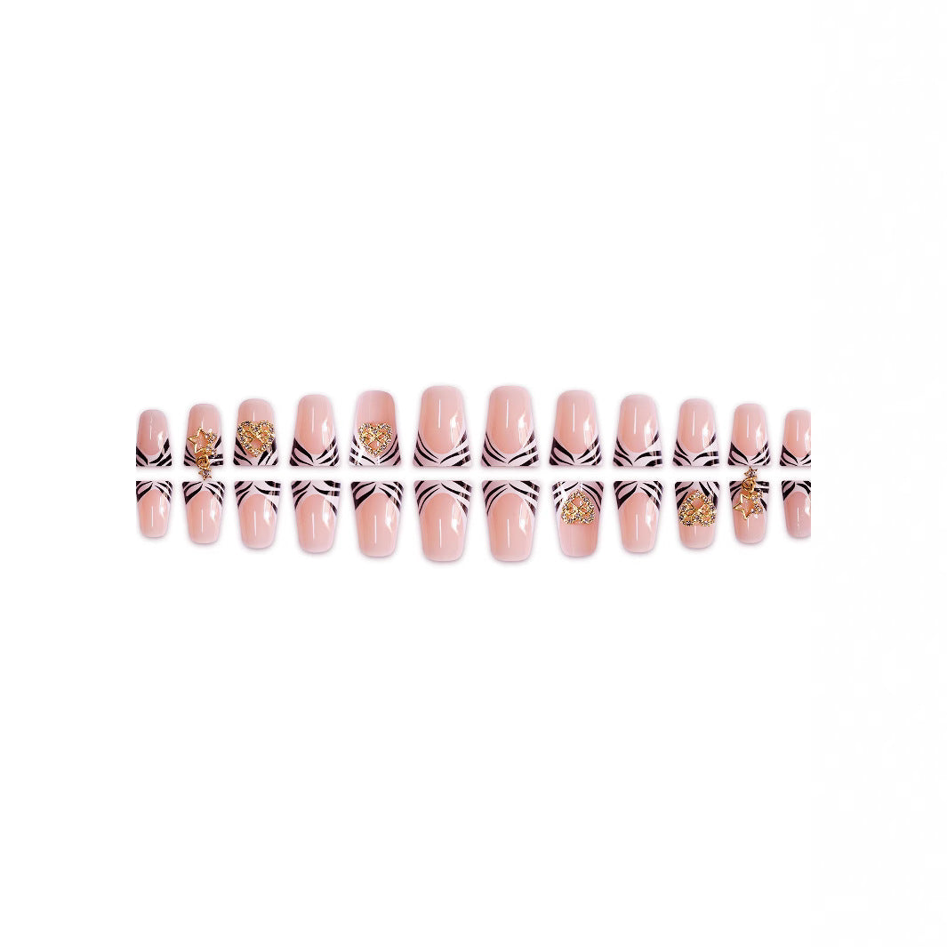 Artistic Zebra-Patterned Nail Enhancements with Gem Accents Stornfield