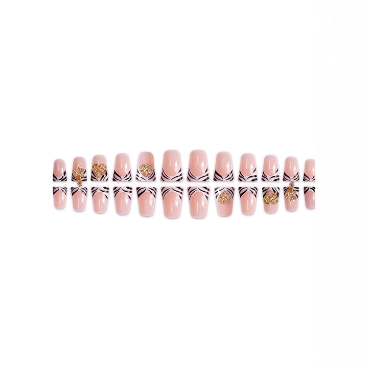 Artistic Zebra-Patterned Nail Enhancements with Gem Accents Stornfield
