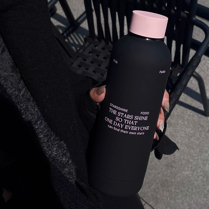 Women's insulated bottle with ergonomic design and practical carrying strap Stornfield
