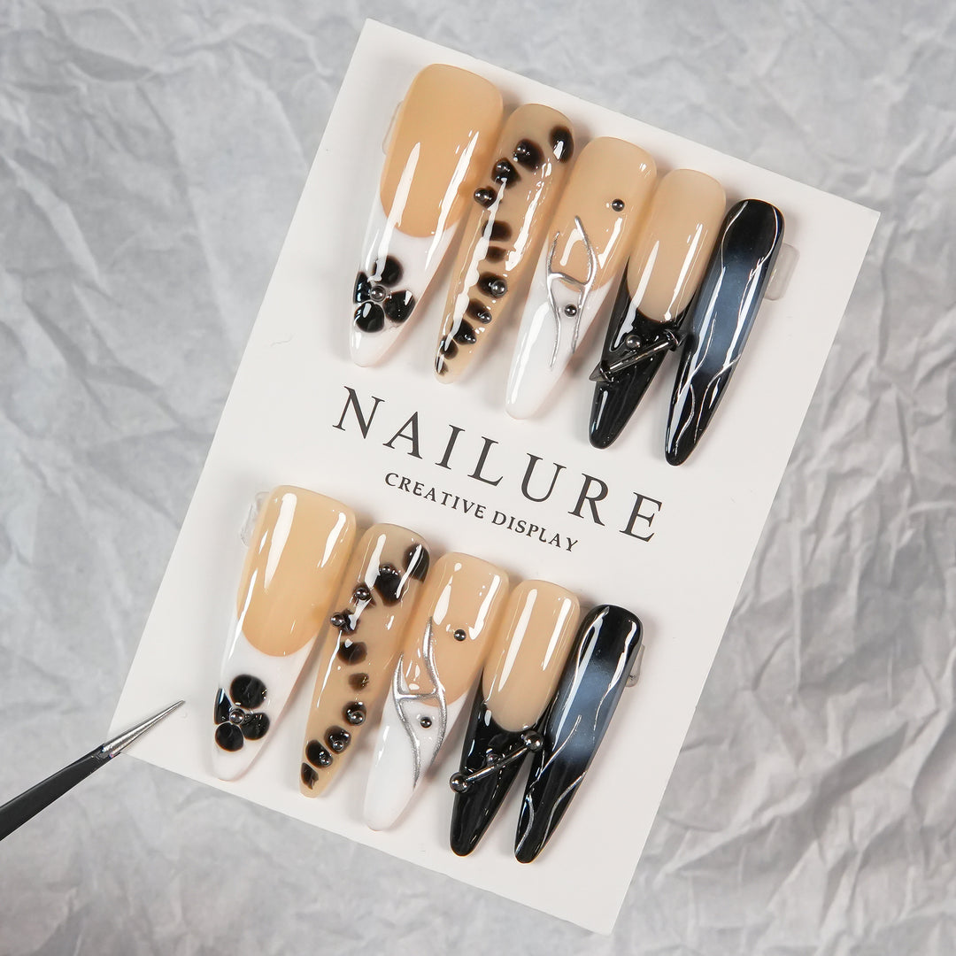 Artistic Stiletto Press-On Nails with Unique Patterning