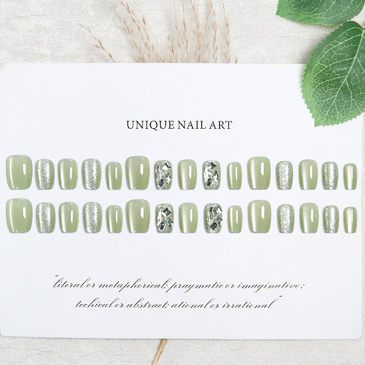 Acrylic nail set with elegant glitter design and creative effects Stornfield