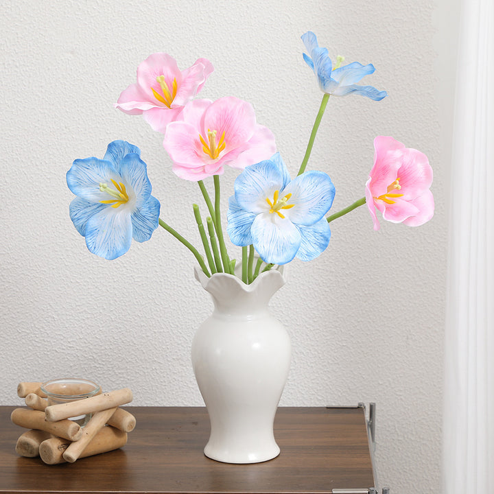 Artificial orchid flower branch with intricately detailed flowers