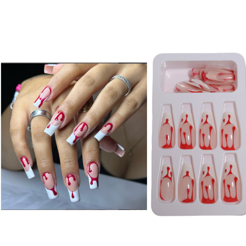 Artistic Press-On Nail Design with Dripping Effect Stornfield