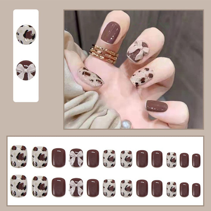 Artful nail tips with elegant foil decorations Stornfield
