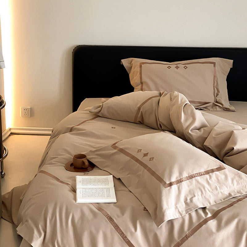 Luxurious cotton satin bedding set with embroidered border edge
