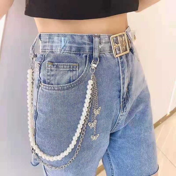 Fashionable belt with pearl and chain pendants Stornfield