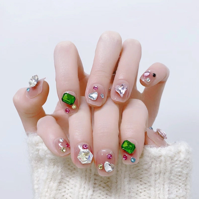 Acrylic nail set with sparkling 3D applications and beautiful heart designs Stornfield