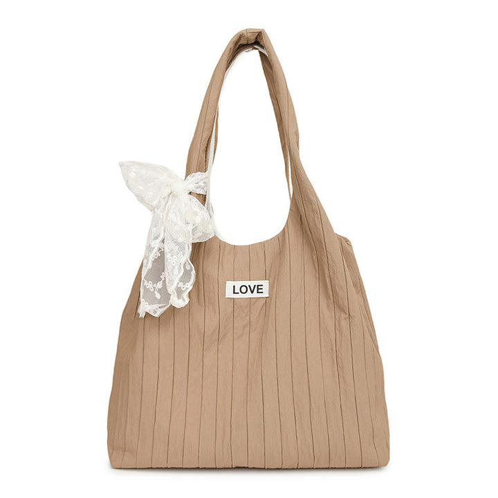 Leisure bag with structured design and playful scarf Stornfield