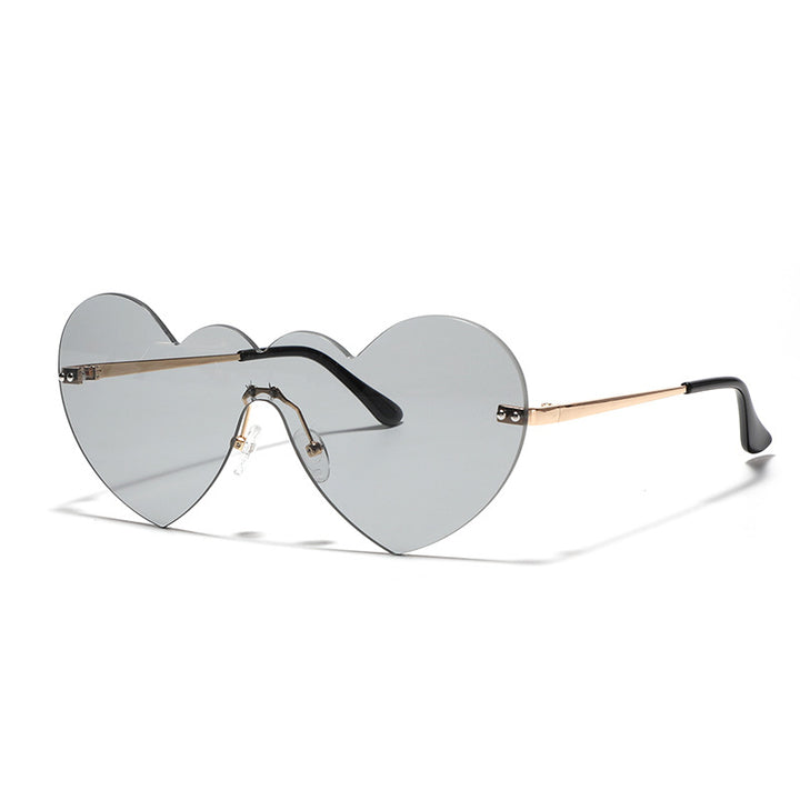 Ladies extravagant heart sunglasses with protective lenses Stornfield