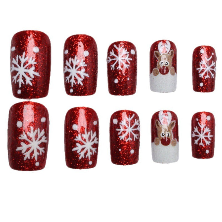 Creative artificial nails with festive reindeer design Stornfield
