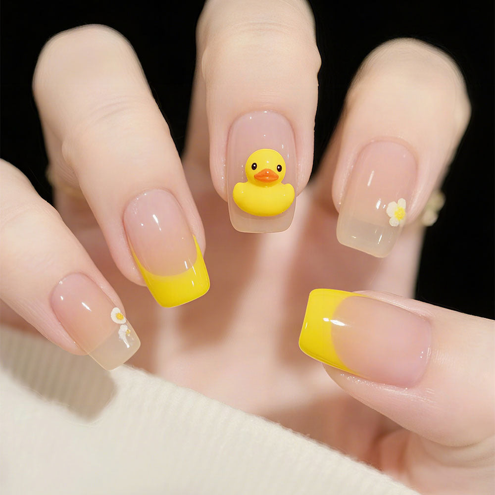 Artificial nails with playful duck design and summery color gradient Stornfield