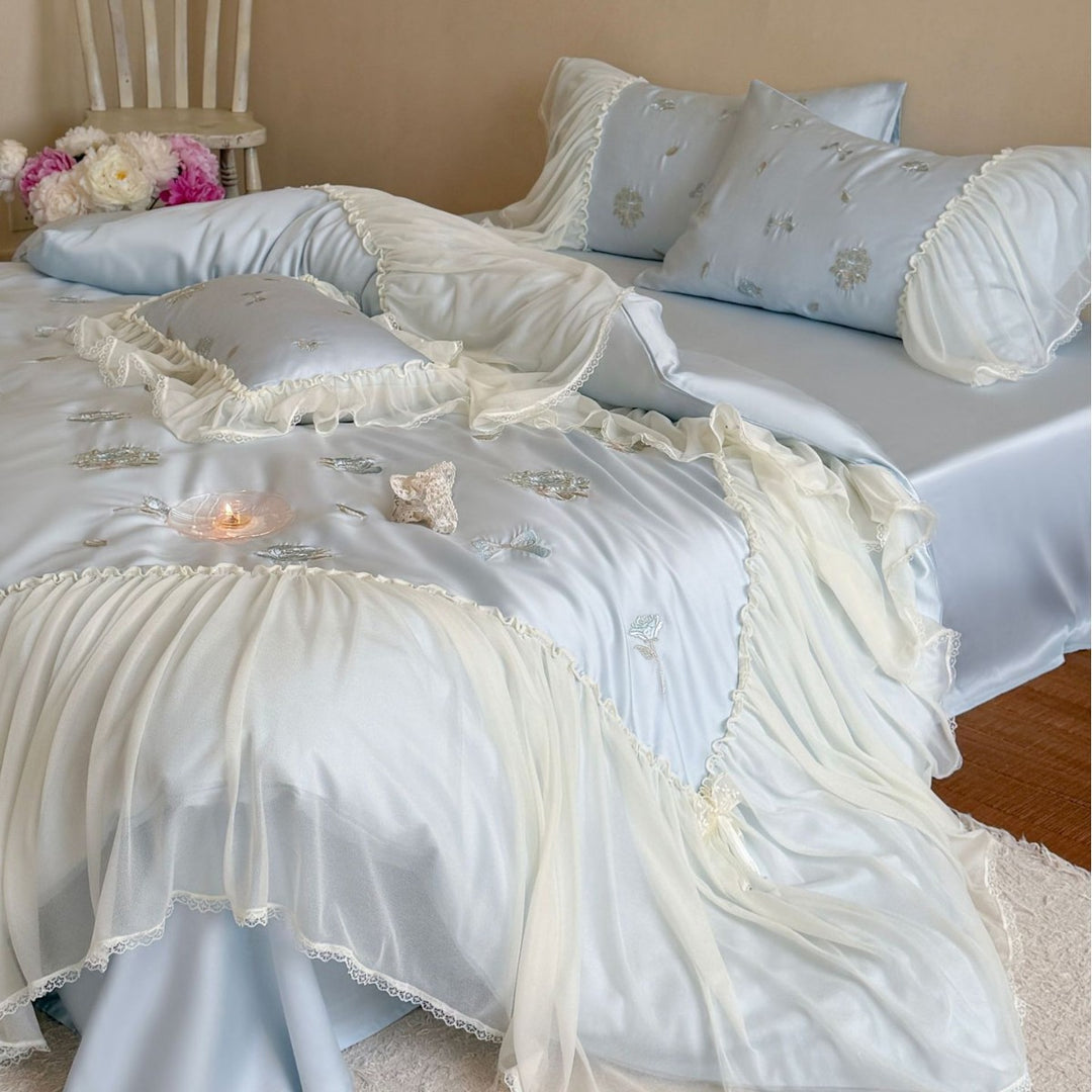 Romantic embroidered bedding set with ruffled frill and tulle overlay