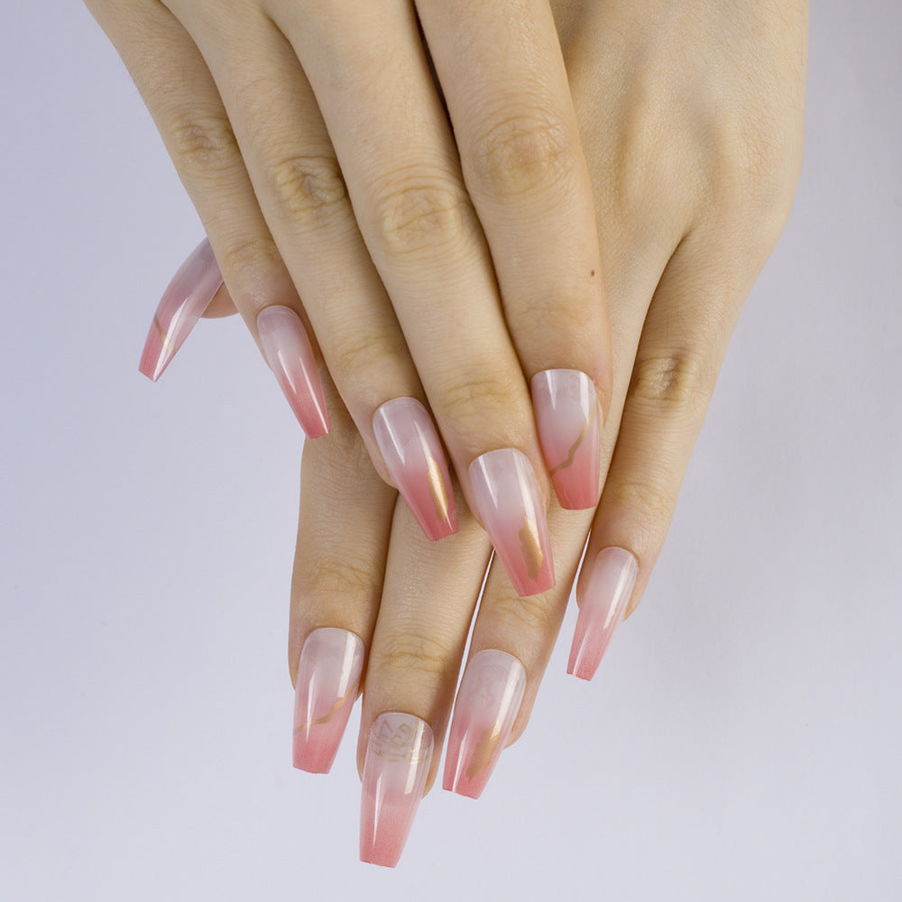 Nail art in an elegant gradient with gold accents Stornfield