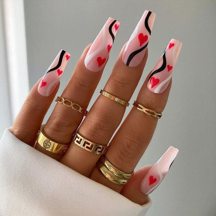 Artificial nails with romantic heart designs and elegant design Stornfield