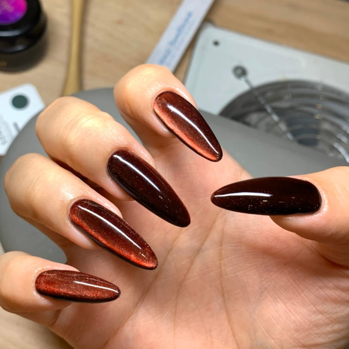 Artificial nails in modern glamour look Stornfield