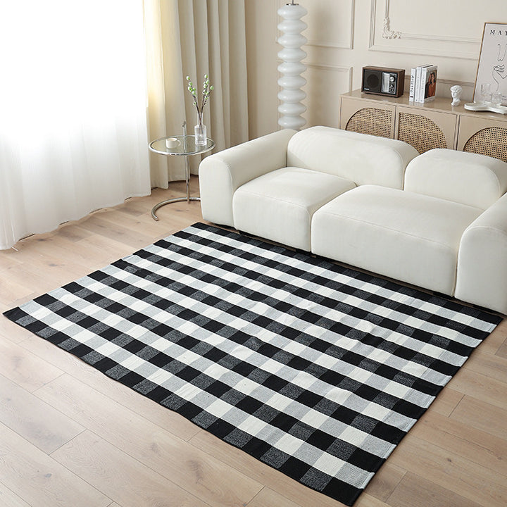 Woven living area rug with large check pattern and flat cotton texture Stornfield