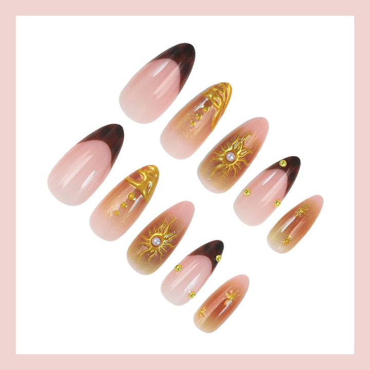 Artificial nail set with elegant gold pearls and delicate designs Stornfield