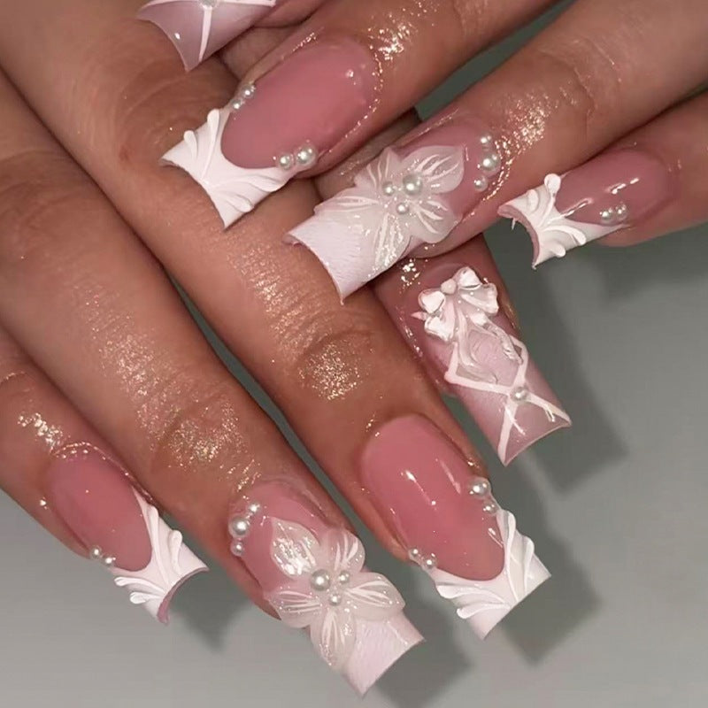 Nail set with elegant flower and glitter decorations Stornfield