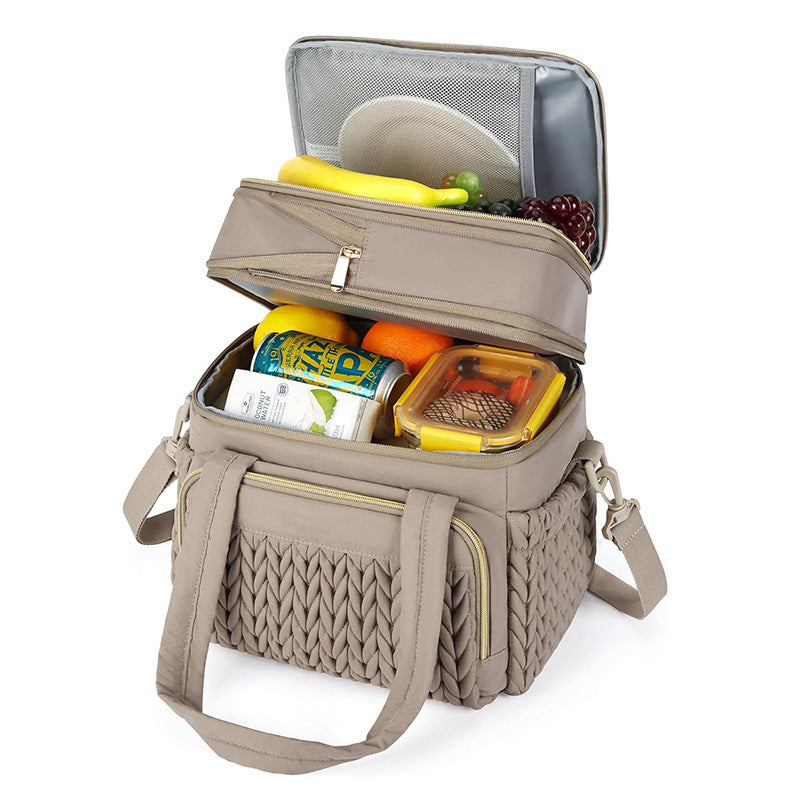Insulated picnic bag with multi-layered interior compartment and practical carrying system Stornfield