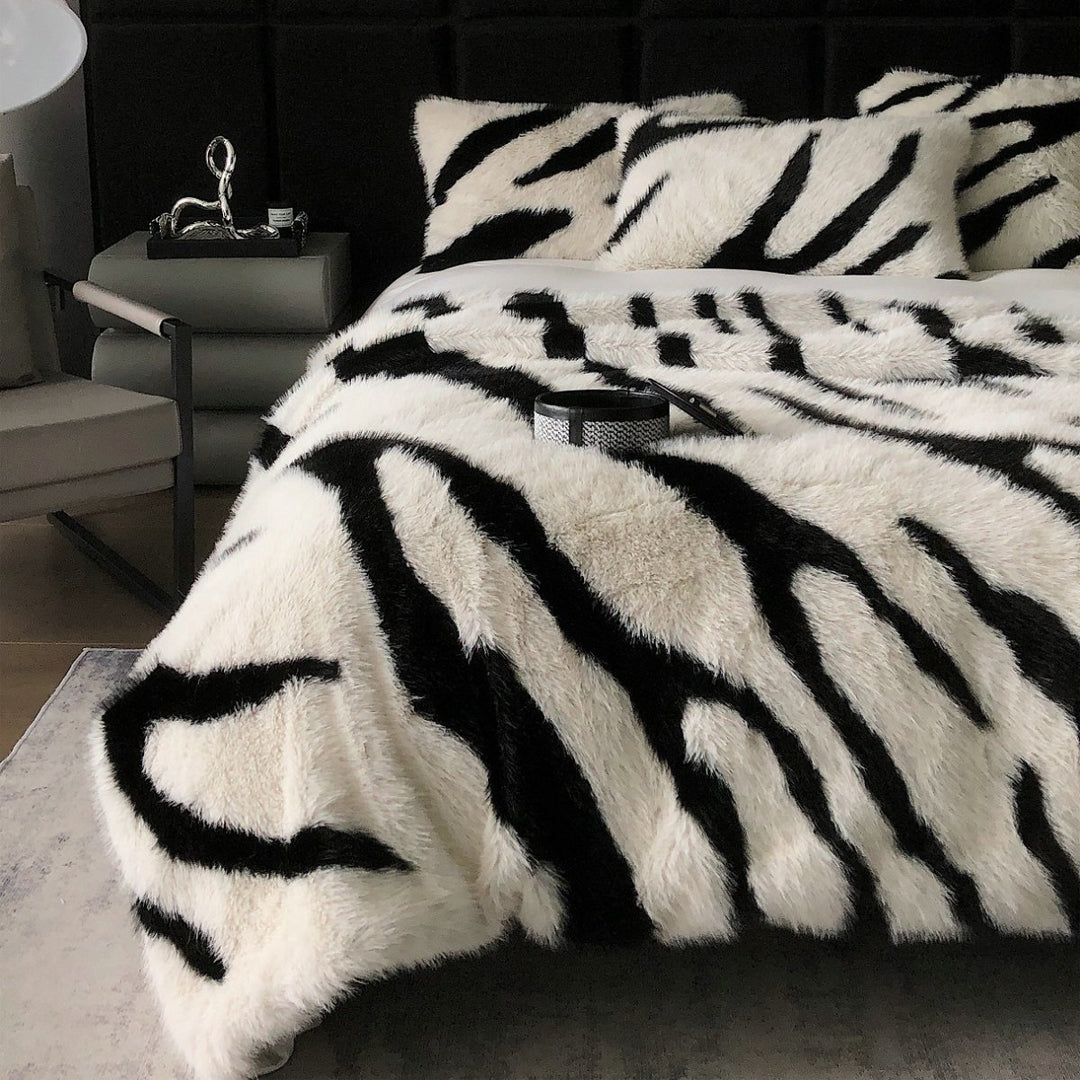 Faux fur bedspread with zebra design and extra fluffy texture