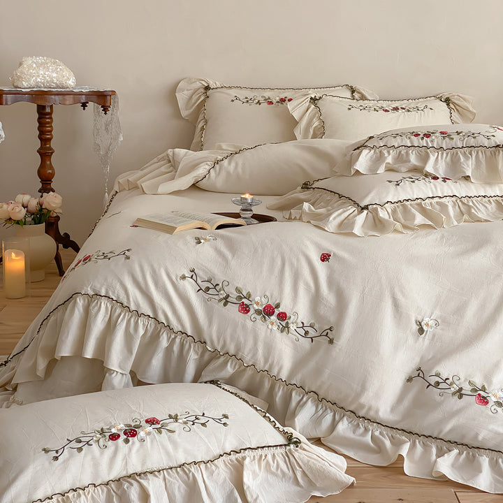 Country house style embroidered bedding set with strawberry motif and ruffle