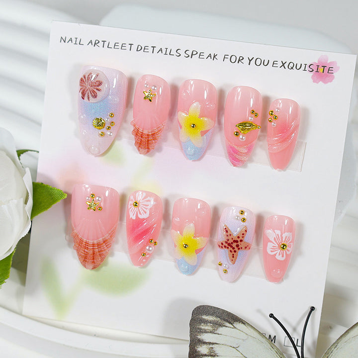 Artificial nail set with maritime designs and glittering accents Stornfield
